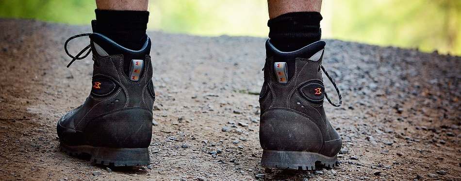 man wearing hiking shoes