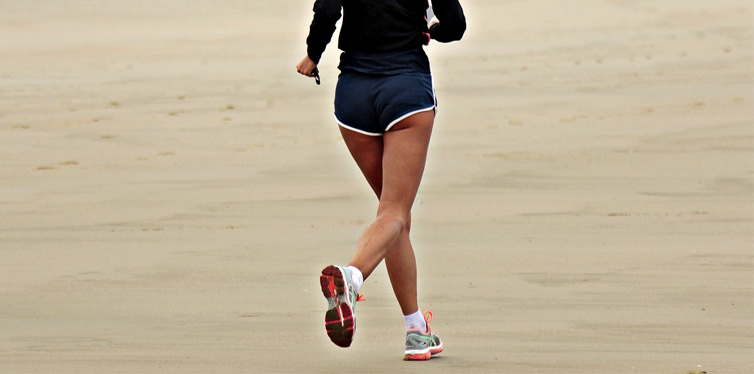 girl running at the beach