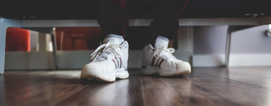 white sneakers slippery floor